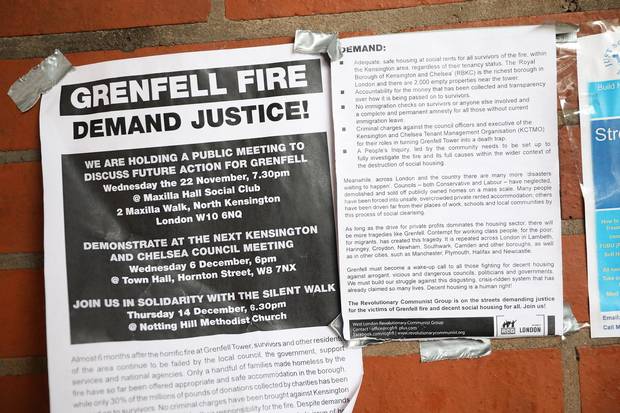 A public notice hangs near Grenfell Tower on December 11, 2017 in London, England.
