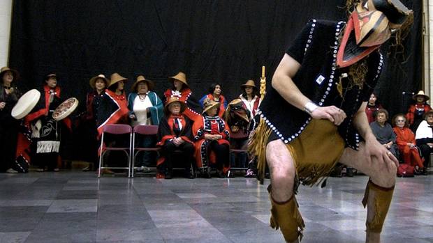 A Haida performer dances in a ceremony at Chicago’s Field Museum on Oct. 17, 2003, to mark the museum’s return of about 150 Haida human remains to the their descendants.