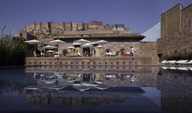 The mammoth Mehrangarh Fort is seen behind RAAS, a haveli (mansion) converted into a hotel in Jodhpur.