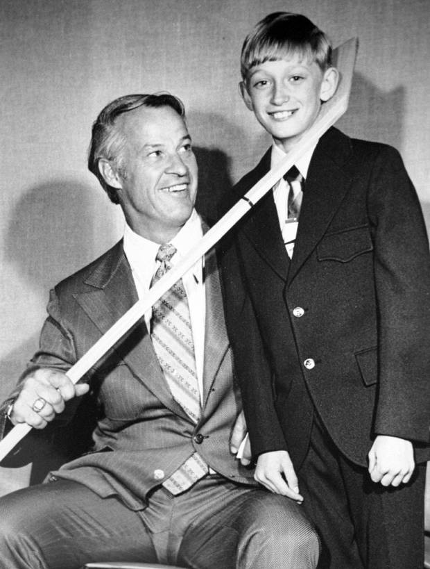 FILE PHOTO 1972 - Saying it will take a miracle to keep him from retiring, New York Rangers Wayne Gretzky will make an announcement on his future when he meets the media in New York April 16. Gretzky is shown standing with hockey great Gordie Howe (L) when he was 12-years-old in Brantford, Ontario, in 1972, the city Gretzky was born in.