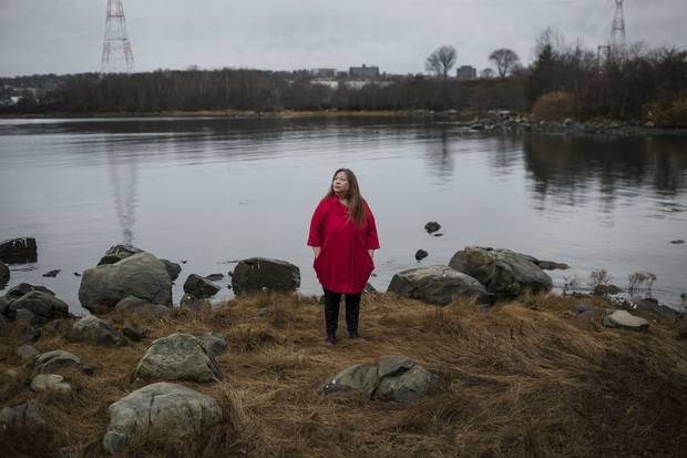 Cathy Martin of Millbrook First Nation stands on the shores opposite Halifax where Mi’kmaw families once lived at Kepe’kek, which means ‘at the narrows,’ until disaster struck in the Halifax Explosion 100 years ago.