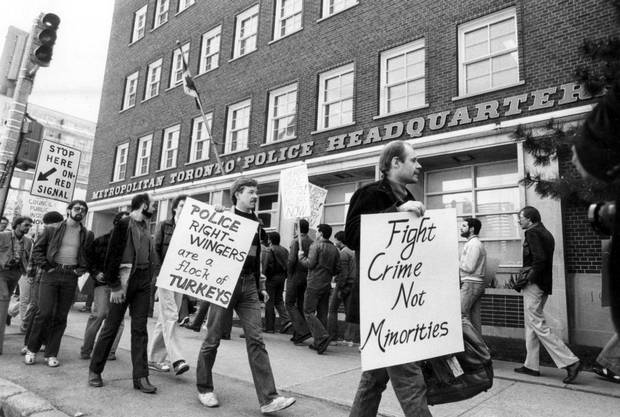 Members of Toronto’s gay community and supporters march past Metro Toronto Police Headquarters on Jarvis Street during a rally May 3, 1981. About 200 individuals picketed the police headquarters to protest against a series of charges as a result of the police raids on four gay bathhouses in February 1981. Originally published May 4, 1981.