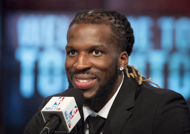 DeMarre Carroll smiles during an introductory press conference in Toronto in July.
