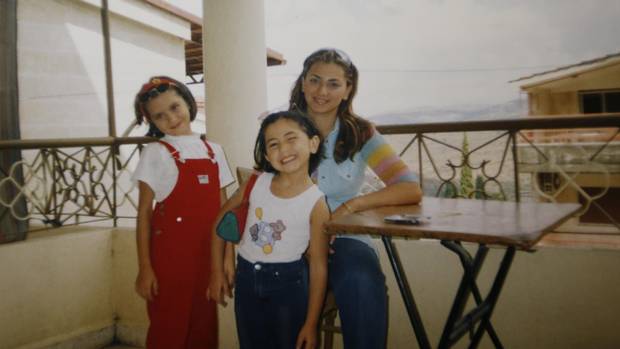 Nancy Solakian, a Syrian refugee who immigrated to Canada in search of a better life, with her mom Ani and sister Mery, left.