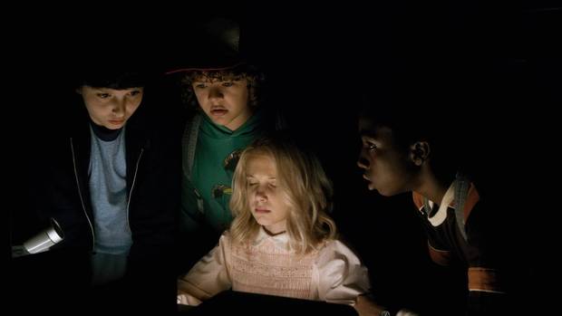 Millie Bobby Brown, Finn Wolfhard, Gaten Matarazzo and Caleb McLaughlin are seen in Netflix’s Stranger Things.