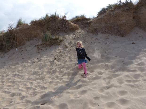 Playing on the dunes in North Norfolk.