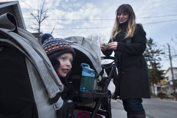 Three-year-old Benjamin Kleiman – shown with his mother, Amy Lazar Kleiman – was born in November, so he’ll be much younger than the other children when he begins junior kindergarten in the fall.