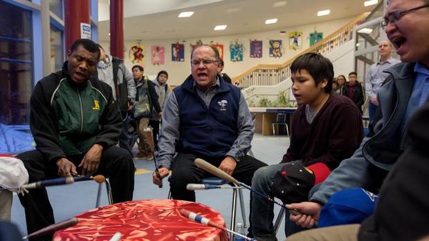 Stephen Wood, second from left, leads a morning drum circle at Ermineskin Junior Senior High School in Maskwacis, Alta. Mr. Wood is a Cree language teacher at the school and his drum group, Northern Cree just received its seventh Grammy nomination.