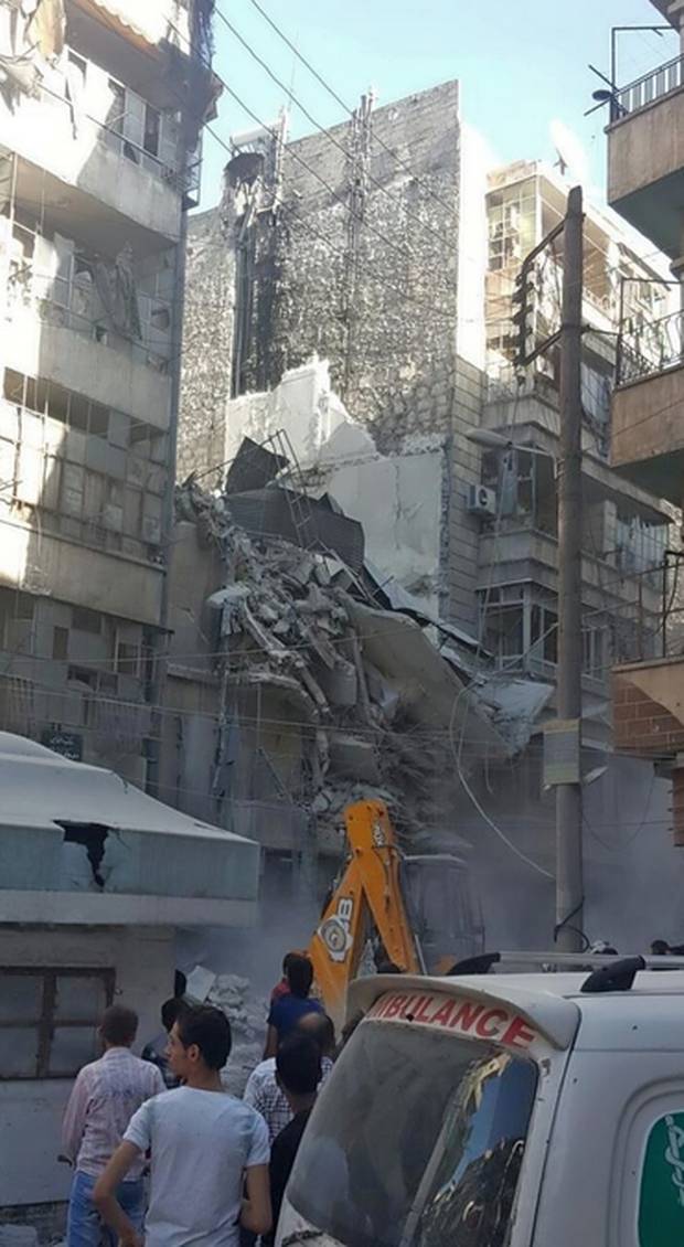 This Twitter photo from Bana Alabed's Twitter account shows a collapsed building in her neighbourhood.
