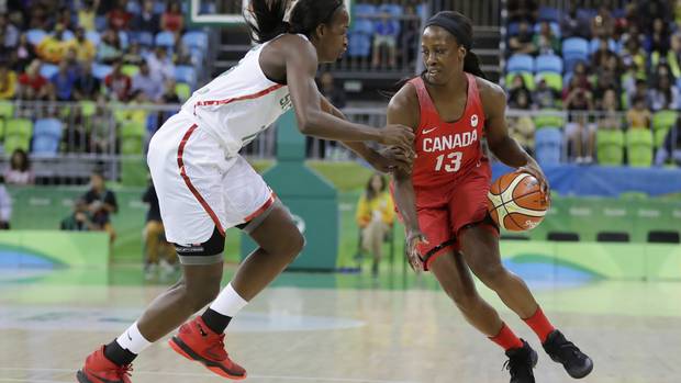 Canada forward Tamara Tatham drives on Senegal forward Mame Marie Sy during the first half of a women's basketball game at the Youth Center at the 2016 Summer Olympics in Rio de Janeiro, Brazil, Wednesday, Aug. 10, 2016.