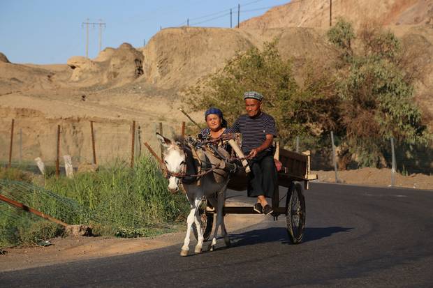 In the arid Turpan region, the largely Muslim Uyghurs live in oasis areas.