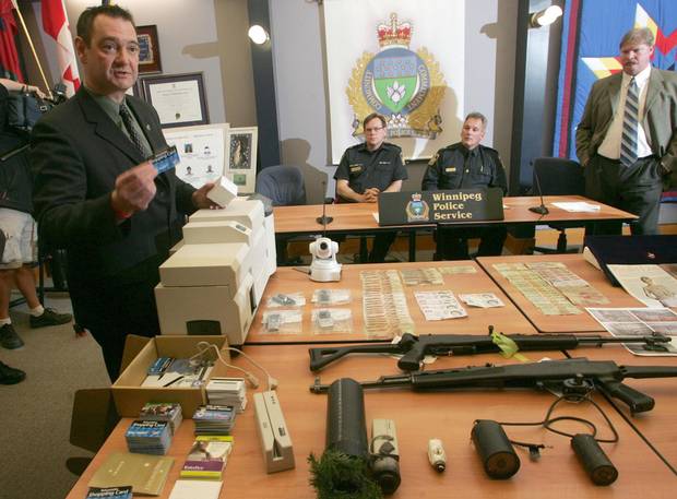 Sgt Larry Levasseur, left to right, Winnipeg Police Superintendent Gordon Schumacher, Inspector Thomas Legge and Sgt. Mitch McCormick appear at a news conference in Winnipeg in 2007 as part of lengthy investigation dubbed Project Kite, which seized the antique Koechert Diamond Pearl.