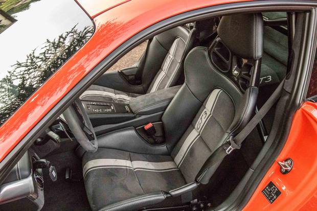 The deep seats of the new GT3 feel 'like falling into a well,' writes Brendan McAleer.