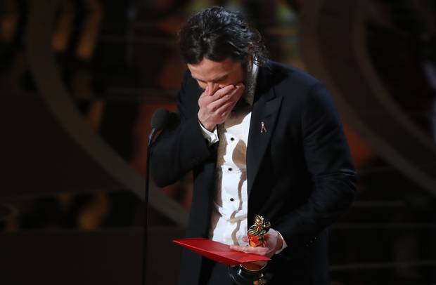 Casey Affleck reacts as he accepts the Oscar for Best Actor for 