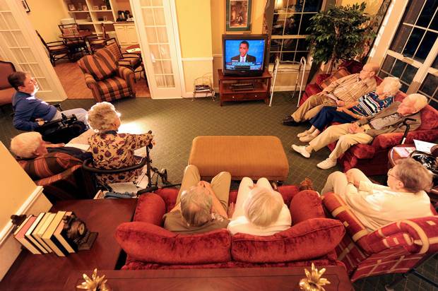 A group of retired seniors gathers at an assisted living residence in Maryland to watch the final presidential debate of 2008 between Barack Obama and John McCain.