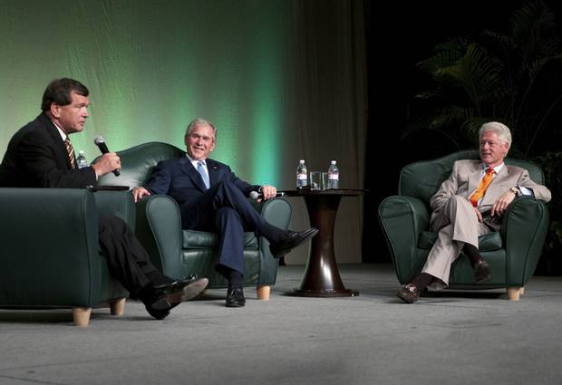 Frank McKenna, left, with former U.S. presidents George W. Bush and Bill Clinton in Toronto.