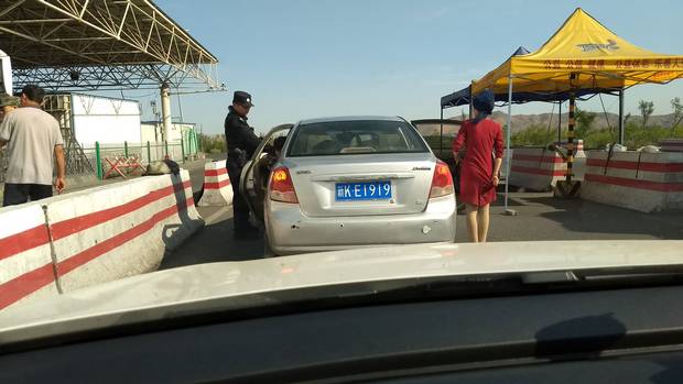 At regular checkpoints on highways across Xinjiang, Uyghur people must submit to vehicle searches and pass through devices that scan identification cards and use facial recognition software to track and manage people’s movements.