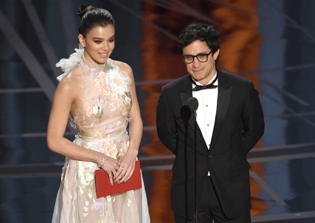 Hailee Steinfeld, left, and Gael Garcia Bernal present the award for best animated feature film at the Oscars on Sunday, Feb. 26, 2017, at the Dolby Theatre in Los Angeles.