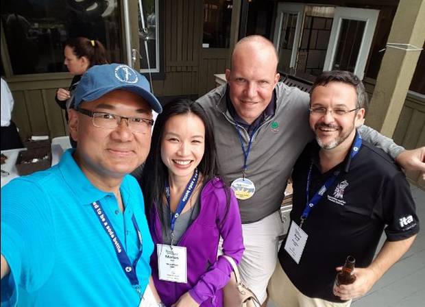 Marian Ngo (second from left) and Byng Giraud (far right) at a 2016 golf tournament and fundraiser with B.C. Liberal MLA John Yap (far left).
