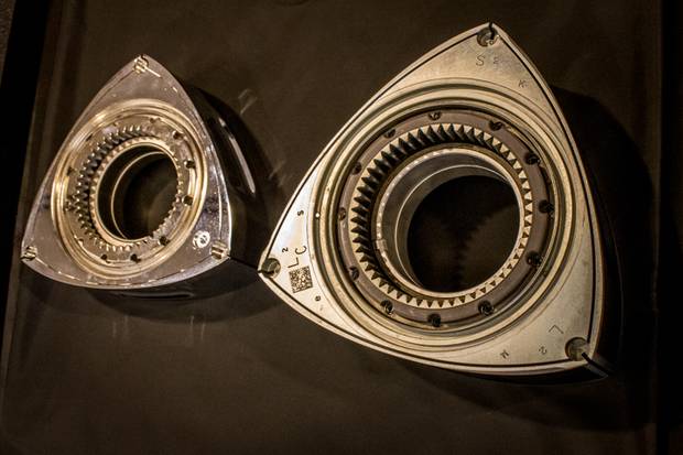 On the right, a rotor from a Mazda RX-8. On the left, Mazda's compact rotor as used in range-extenders and generators.