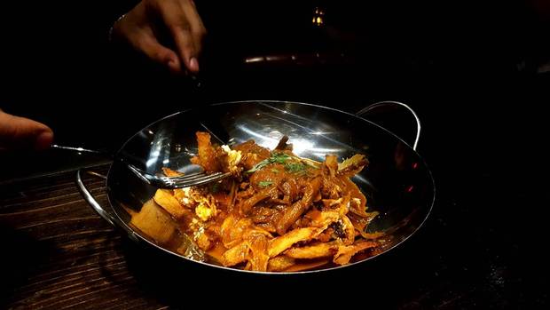 If you’re looking for Indian street food on a budget, try the curried brisket poutine at Ji, at St. Clair Avenue West and Christie.