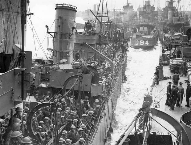 After a successful emergency sealift from a beachhead at Nazi-occupied Dunkirk, France, British and French soldiers arrive safely at an unknown British port, in June 1940.