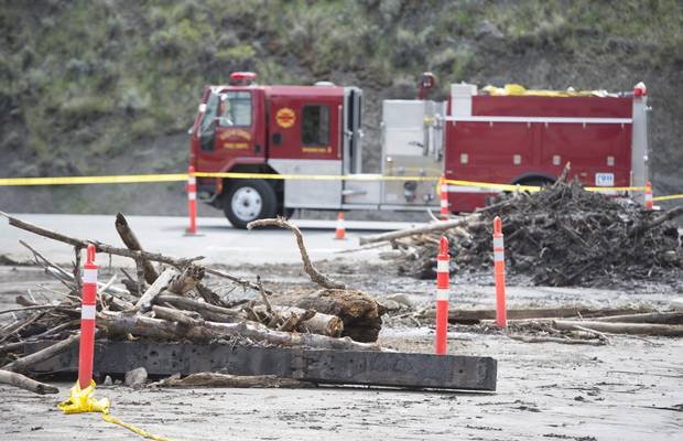 Flood debris is seen on the road in Cache Creek, B.C., Saturday, May 6, 2017. The small B.C. community was hit this week with flooding from melting snow pack.