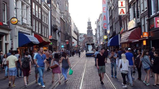 The Netherlands pioneered the concept of the 'living yard,' where pedestrians and cyclists share the road with vehicles moving at a walking pace.