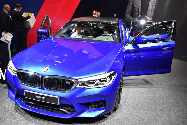 A BMW M5 car is presented at the Frankfurt Auto Show IAA in Frankfurt am Main, Germany, on September 13, 2017. According to organisers, around 1,000 exhibitors from 39 countries will showcase their products and services. This year's fair running from September 14 to 24, 2017 will focus on digitization, urban mobility and electric mobility. / AFP PHOTO / Tobias SCHWARZTOBIAS SCHWARZ/AFP/Getty Images