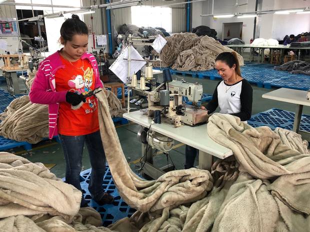 Cambodian workers make blankets and quilts at a Chinese-owned factory in the Sihanoukville Special Economic Zone, one of the most prominent of China’s investments in Cambodia.