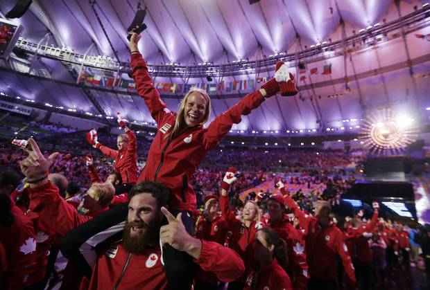 Athletes from Canada march in during the closing ceremony in the Maracana stadium at the 2016 Summer Olympics in Rio de Janeiro, Brazil, Sunday, Aug. 21, 2016.