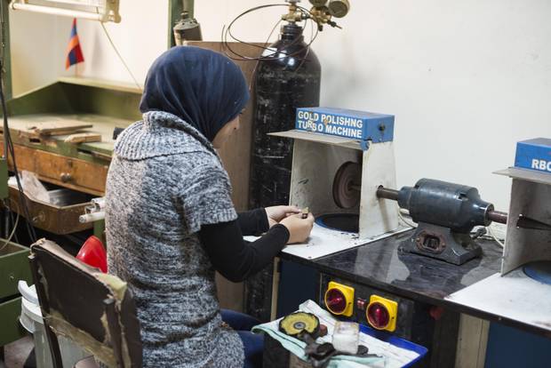 Refugees around the world are being trained to make pins for The Pin Project in workshops like this one in Amman, Jordan.