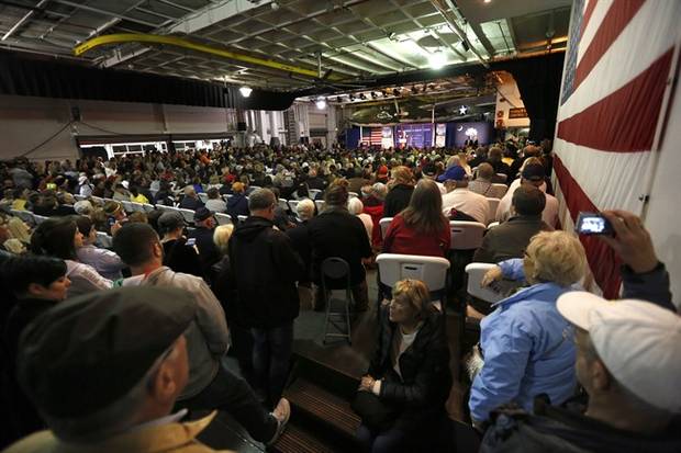 An overflow crowed fills the hangar deck of the USS Yorktown as Republican presidential candidate, businessman Donald Trump, speaks during a rally coinciding with Pearl Harbor Day at Patriots Point aboard the aircraft carrier USS Yorktown in Mt. Pleasant, S.C., Monday, Dec. 7, 2015. 