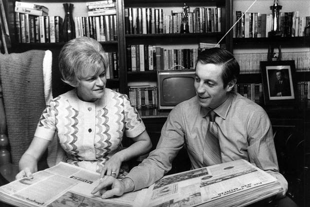 Mme Elise Beliveau goes over some of the highlights of her husband's 18-year NHL career, in Montreal, on March 3, 1971. Former Montreal Canadiens star Jean Beliveau died Tuesday at the age of 83. THE CANADIAN PRESS/UPI