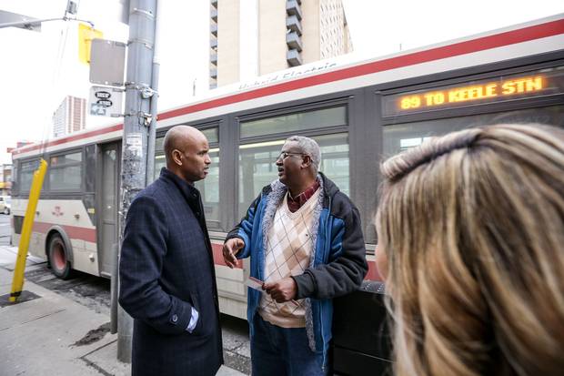 Mr. Hussen talks with a resident on his tour of York South-Weston, one of Canada’s most ethnically diverse ridings.