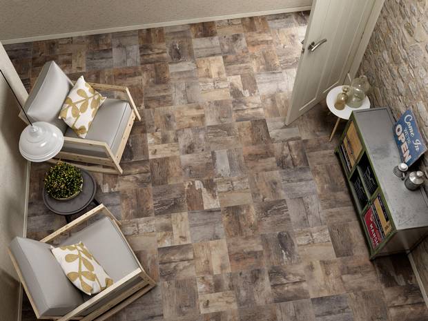 This Peronda tile may look like reclaimed wood parquet, but it’s actually printed ceramic -- one of a slew of new ‘tech tiles’ being dubbed design’s most customizable new finish.