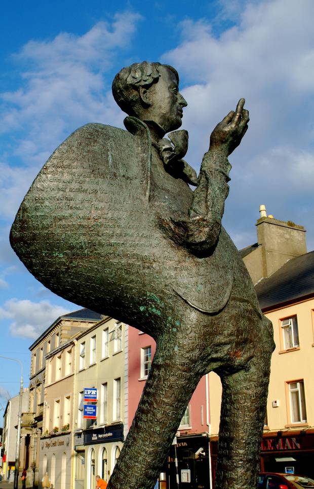 A statue of Yeats overlooks a street in Sligo.