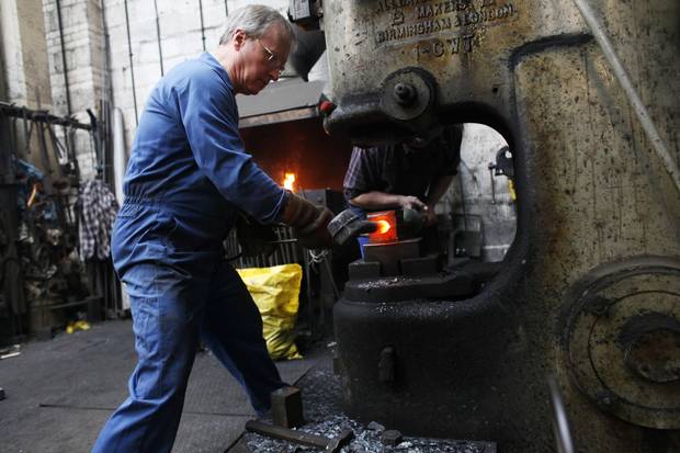 At Whitechapel Bell Foundry in 2012, Allan Hughes works on forging a clapper with Peter Trick for bells in honour of Queen Elizabeth II’s Diamond Jubilee. (Read Elizabeth Renzetti’s 2012 report on the making of the bells and their role in the jubilee.)