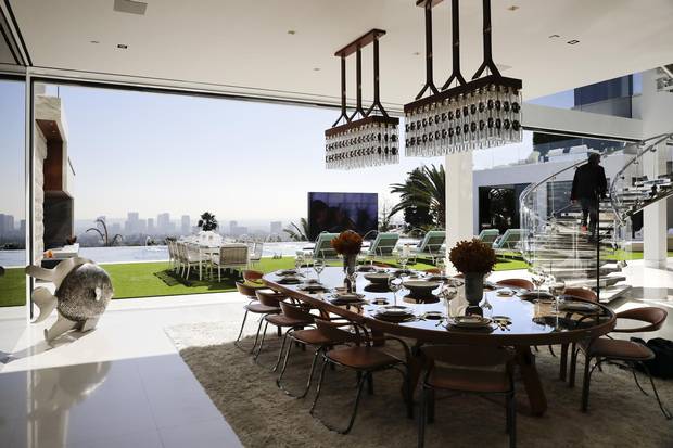 The property has outdoor dining areas, with stunning views of Los Angeles.