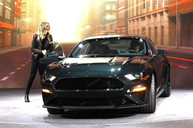 Molly McQueen, the granddaughter of actor Steve McQueen, gets out of the new 2018 Ford Mustang Bullitt at its debut at the 2018 North American International Auto Show January 14, 2018 in Detroit, Michigan.