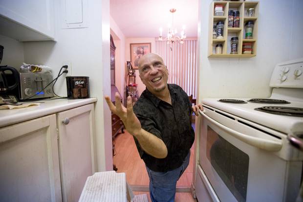 Thalidomide survivor Paul Settle is shown at his Hamilton home.