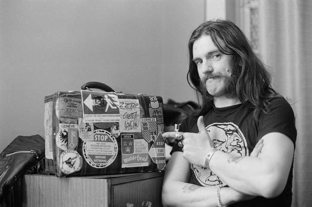 Lemmy Kilmister points to a tour case backstage at City Hall in Newcastle, England, on March 22, 1982.