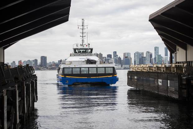 A TransLink SeaBus arrives at the Lonsdale Quay SeaBus station in North Vancouver, B.C., on August 20, 2015.