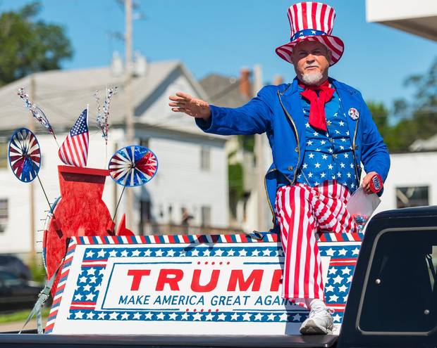 A man dressed as Uncle Sam rides a Donald Trump float during the Northside June Festival Parade on June 4 in St. Joseph, Missouri.