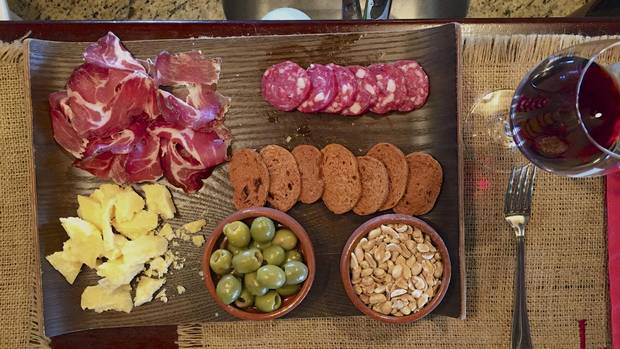 A traditional Uruguayan snack plate (called a picada) with cheeses, prosciutto and salami at El Legado.