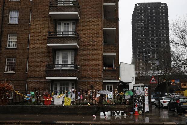 Six months later, a memorial continues to be maintained honouring the victims of a deadly high-rise fire in London at the Grenfell Tower, right. Not only did the blaze kill 71 people in the social-housing tower, its aftermath has exposed divides in Britain involving race, religion, wealth and privilege.