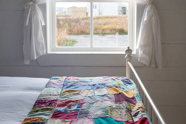 Quilts created by the Fogo Island Anglican Church Women’s Group top most beds and many guests seek out their own to take home as a souvenir. 