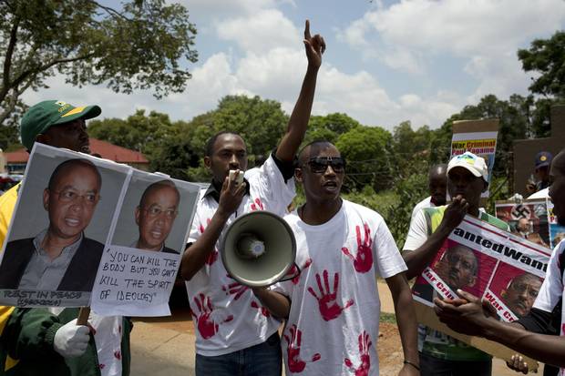 Rwanda National Congress supporters demonstrate in support of slain party founder Patrick Karegeya in 2014. Another case of a plot to kill RNC supporters abroad has been revealed in South Africa.