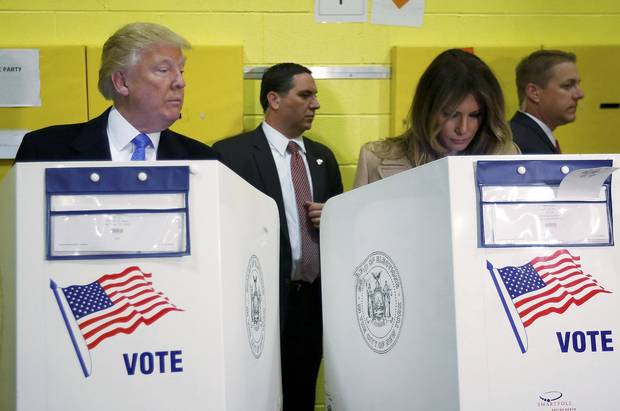 Donald Trump and his wife, Melania, vote at PS 59 in New York.