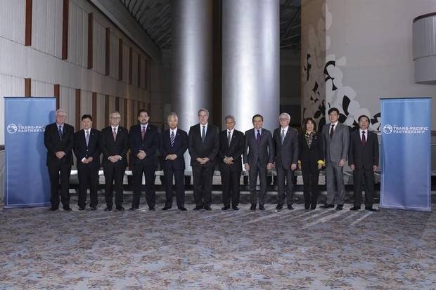 Trade ministers from a dozen Pacific nations are shown in Atlanta on Oct. 1, 2015.